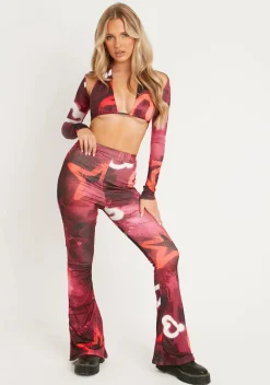 Rave Outfits|Trousers*Missy Empire Odette Graffiti Print Fla Trousers Red