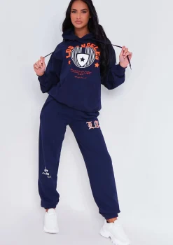 Airport Vibin'|Trousers*Missy Empire Teyana Navy Los Angeles Varsity Slogan Joggers